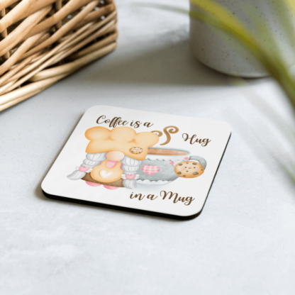 A Product image of 1 of 4 coasters with a watercolor gnome, illustrated cookie, Coffee is a Hug in a Mug