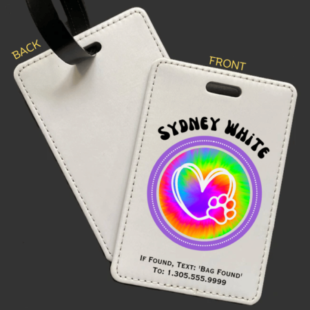 A product image of a luggage tag with the traveler's full name, if found text keyword and mobile phone number, tie dye printed with a heart and paw in the center of a purple circle