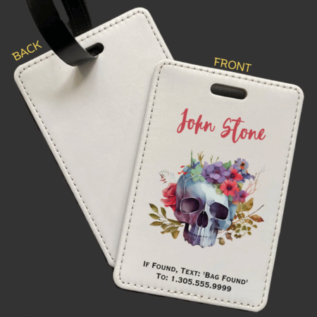 A product image of a luggage tag with the traveler's full name, if found text keyword and mobile phone number, printed with a skull surrounded by colorful flowers