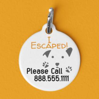 A product image of a pet ID tag with the features and paws of a puppy, and the words I escaped! Please call, and a custom phone number