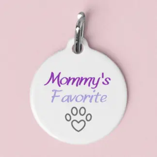 A product image of an aluminum pet id tag with Mommy's Favorite printed in purple and a heart shaped paw print outline