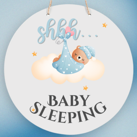 A product image of a baby sign with illustrated watercolor bear wrapped in a blanket, sleeping on a cloud and printed with the words Shhh... Baby Sleeping