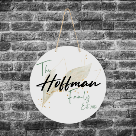 A product image of a hanging sign, personalized with the family's surname and the year the family was established