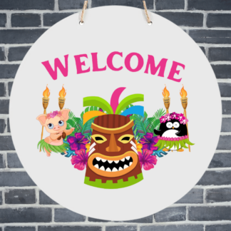 A product image of a hanging welcome sign with a luau theme, printed with a penguin and a pig in grass skirts, with tropical flowers, tiki torches, and a tribal mask