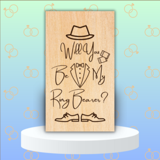 A product image of an engraved wedding party proposal card with a boy's Fedora, cufflinks, bow tie, button down, and lapels of a tuxedo, and dress shoes. The words Will You Be My Ring Bearer?