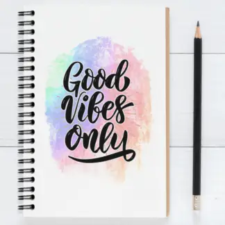 Product image of an motivational journal notebook, along side a pencil