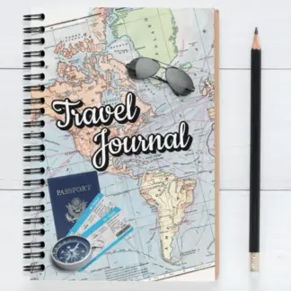 Product image of an travel journal notebook, along side a pencil